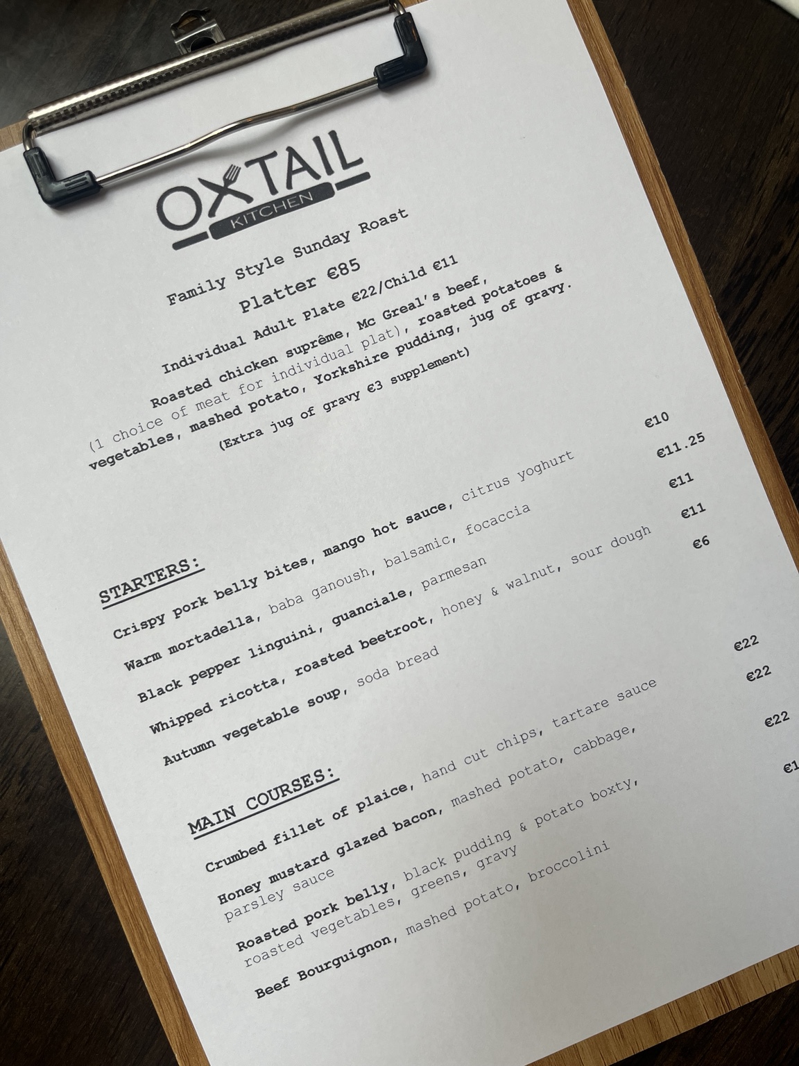 Oxtail Kitchen Sunday menu with family style roast, starters and main courses